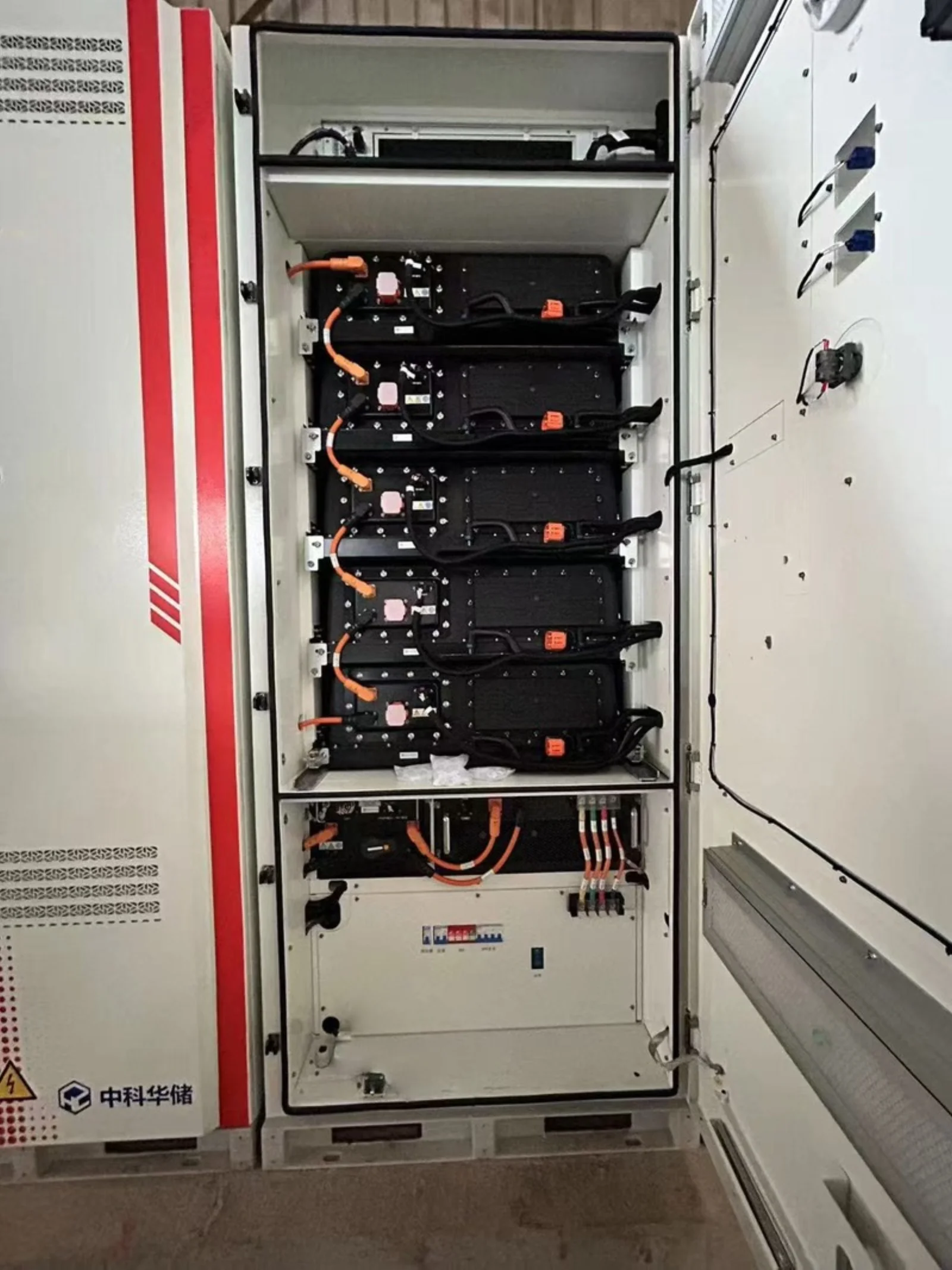 Interior view of Hua Power 100kW/215kWh integrated liquid-cooling cabinet showing battery modules